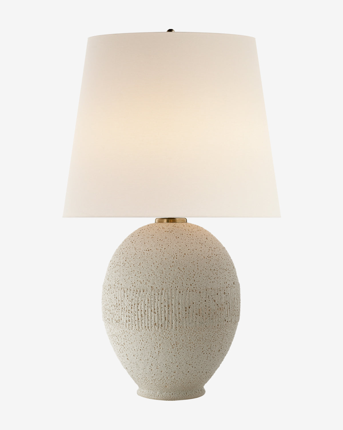 The Toulon Table Lamp features an off-white oval ceramic base with an oceanic natural texture and a large white linen shade, displayed against a plain white background, by Vendixs