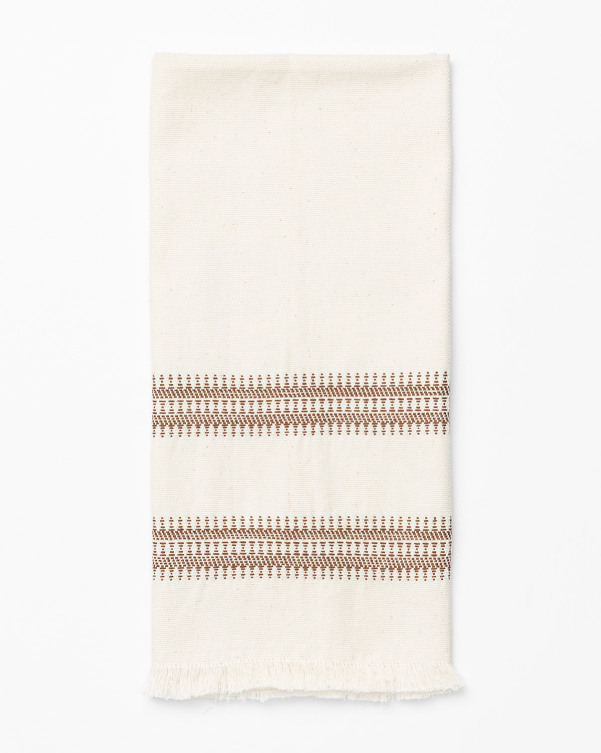 The Woven Stripe Tea Towel features cream cotton with two brown geometric stripes near one end and a short fringe at the bottom—a stylish, textured accent for your kitchen, by Vendixs
